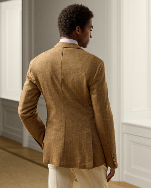 Expertly tailored by hand in Italy, the Hadley is defined by its soft shoulder and exceptionally light weight. This version's wool-and-cotton jersey has been custom-developed and re-interprets a traditional Ralph Lauren Lauren pattern by means of a relaxed knit construction.