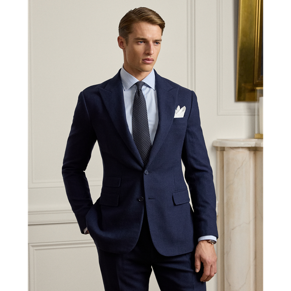 Masterfully tailored by hand in Italy, the Kent combines a lighter construction with fine canvassing and a soft shoulder to create a more natural profile. This version's lightweight cloth was custom-developed with Ireland's Magee 1866, which has been a Ralph Lauren Lauren partner for more than 50 years. The herringbone fabric is beautifully woven with a luxurious blend of wool, silk and cashmere.