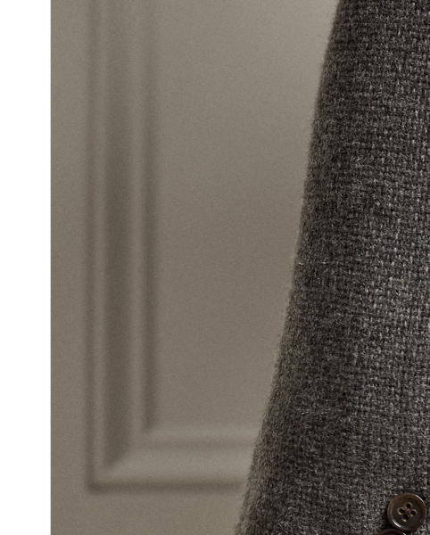 Tailored by hand in Italy, the Hadley is defined by its soft shoulder and exceptionally light weight. This version is crafted with a textured, open-weave cashmere fabric that was custom-developed with Joshua Ellis, a famed English mill that has been creating luxury textiles for more than 250 years.