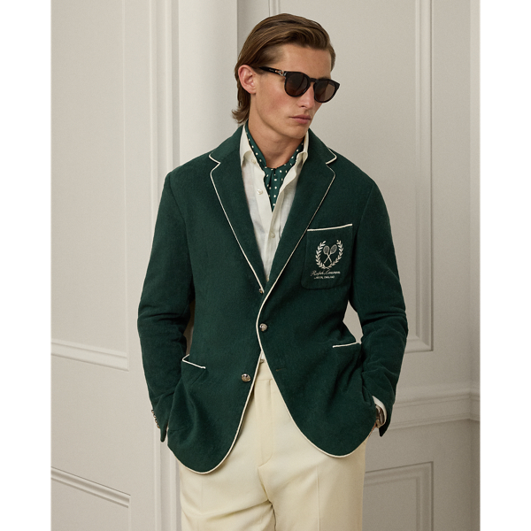 This blazer's plush cotton terry is transformed through masterful Italian hand-tailoring to create a statement of sophisticated ease. Our signature metal buttons and embroidered " Ralph Lauren Lauren" crest perfectly balances heritage detailing with contemporary comfort.