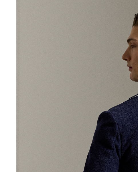 This blazer's plush cotton terry is transformed through masterful Italian hand-tailoring to create a statement of sophisticated ease. Our signature metal buttons and embroidered " Ralph Lauren Lauren" crest perfectly balances heritage detailing with contemporary comfort.