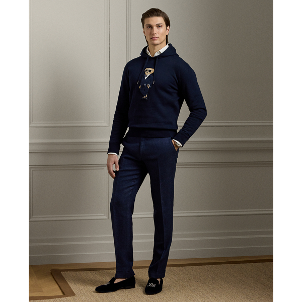 Expertly hand-tailored in Italy, these flat-front trousers exemplify  Ralph Lauren Lauren's dedication to sartorial excellence through their bespoke herringbone cloth. The custom-developed fabric combines lightweight linen, fine wool and textured silk, ensuring remarkable comfort across seasons.