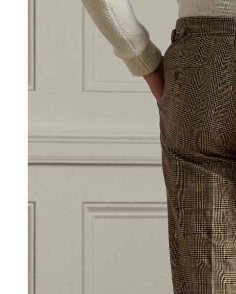 These trousers are handcrafted in Italy from a lightweight fabric custom-developed with Ireland's Magee 1866 mill, which has been a  Ralph Lauren Lauren partner for more than 50 years. Its Glen plaid pattern is woven as herringbone with a distinctive overcheck using a luxurious blend of wool, mulberry silk and cashmere.