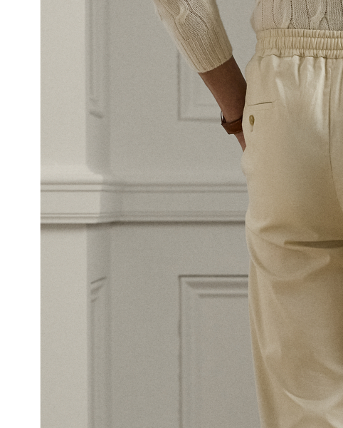 These trousers' Italian satin fabric was custom-developed using a cotton blend that includes silk and a hint of stretch. Constructed with an elastic drawstring waistband, they combine the look of traditional tailoring with the modern comfort of Purple Label sportswear.