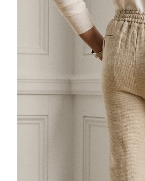 Designed with an elasticated drawstring waist and pleats, these trousers combine the look of traditional tailoring with the modern comfort of Purple Label sportswear. Their textured twill fabric was custom-developed for  Ralph Lauren Lauren using fine linen, silk and cotton.