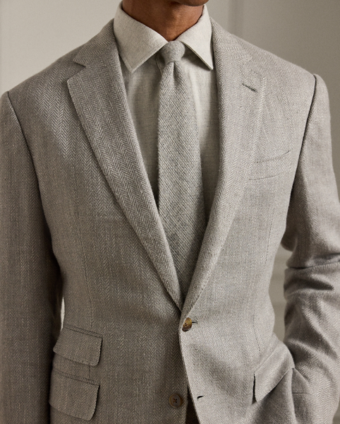 Hand-tailored in Italy, the Kent combines a lighter construction with fine canvassing and a soft shoulder to create a more natural profile. This version's bespoke fabric features a traditional heritage pattern rendered in a modern blend of linen, silk and cotton.