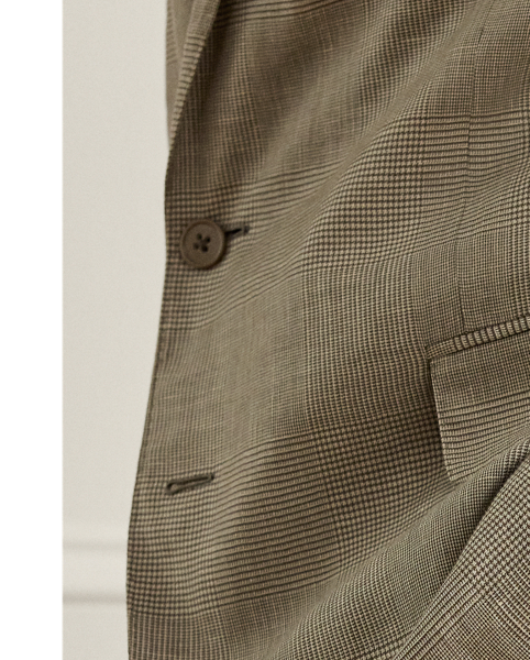 Skillfully hand-tailored in Italy, the Kent combines a lighter construction with fine canvassing and a soft shoulder to create a more natural profile. This version's Glen plaid fabric was custom-developed for  Ralph Lauren Lauren using a luxurious blend of lightweight linen and silk.