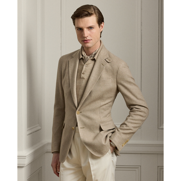 Tailored by hand in Italy, the Hadley is defined by its soft shoulder and exceptionally light weight. This version is crafted from a textured, open-weave fabric custom-developed with Joshua Ellis – a famed English mill, which has been creating luxury textiles for more than 250 years. Its fine cloth is crafted using a luxurious blend of wool, silk and cashmere.