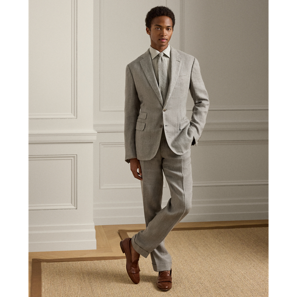 Exemplifying Purple Label's dedication to sartorial excellence, these flat-front trousers are meticulously hand-tailored in Italy with precision and care. The bespoke herringbone cloth – a sophisticated fusion of linen, silk and cotton – creates an exceptional drape and refined texture.