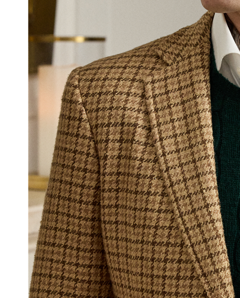 Hand-tailored in Italy, the Kent combines a lighter construction with fine canvassing and a soft shoulder to create a more natural profile. This version's fabric was custom-developed for  Ralph Lauren Lauren using a luxurious blend of lightweight linen, silk and cashmere. Crafted with an open-weave construction, the cloth offers a beautiful drape as well as breathability and features a traditional checked pattern reimagined in a larger scale.