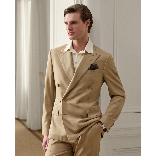 Tailored by hand in Italy, the Kent combines a lighter construction with fine canvassing and a soft shoulder to create a more natural profile. This version is crafted with bespoke wool trench and is one of the most iconic fabrications personally selected by Mr Lauren. Custom-developed with a matte brushed finish, the cloth offers a smooth and luxurious drape.