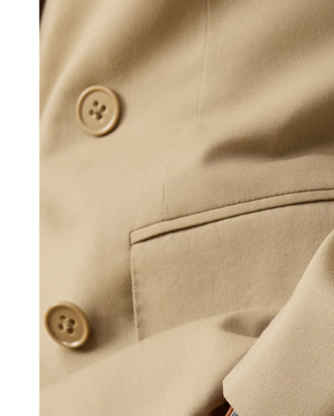 Tailored by hand in Italy, the Kent combines a lighter construction with fine canvassing and a soft shoulder to create a more natural profile. This version is crafted with bespoke wool trench and is one of the most iconic fabrications personally selected by Mr Lauren. Custom-developed with a matte brushed finish, the cloth offers a smooth and luxurious drape.