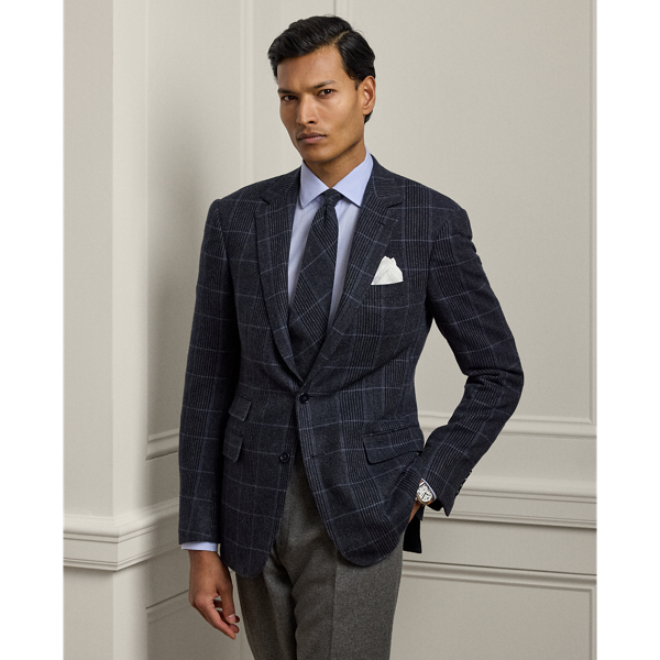 The Gregory combines lightweight canvassing and a modern silhouette with Purple Label's unparalleled quality and fine Italian craftsmanship. At the start of construction, pattern pieces are hand-cut by expert tailors, ensuring precision of the highest calibre. Its plaid cashmere twill was custom-developed with Joshua Ellis, a renowned mill in England that has been creating luxury textiles for more than 250 years. Considered details, such as hand-sewn buttonholes and edges, complete this signature jacket.