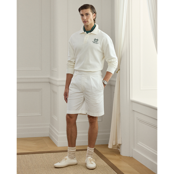 Impeccably tailored by hand in Italy, these pleated shorts showcase Purple Label's masterful interpretation of a classic silhouette inspired by vintage tennis wear. They are constructed from a luxurious stretch chino fabric and then garment-dyed to achieve a relaxed yet sophisticated look.