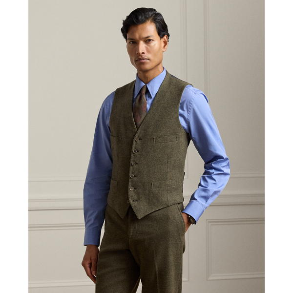 This waistcoat is hand-tailored in Italy from a textured tick-weave cloth, which draws inspiration from a classic  Ralph Lauren Lauren pattern. The custom-developed fabric is beautifully woven with a blend of wool, silk and cashmere.