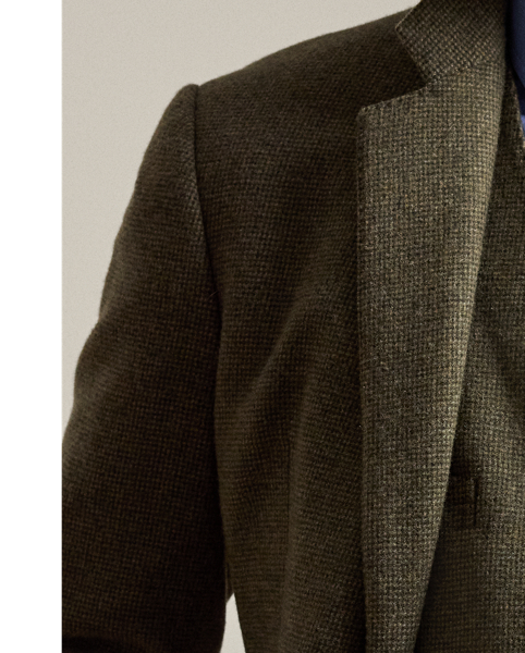 This waistcoat is hand-tailored in Italy from a textured tick-weave cloth, which draws inspiration from a classic  Ralph Lauren Lauren pattern. The custom-developed fabric is beautifully woven with a blend of wool, silk and cashmere.