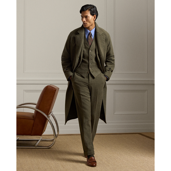 Hand-tailored in Italy, this topcoat is crafted from a textured tick-weave cloth, which draws inspiration from a classic  Ralph Lauren Lauren pattern. The custom-developed fabric is beautifully woven from a blend of wool, silk and cashmere.